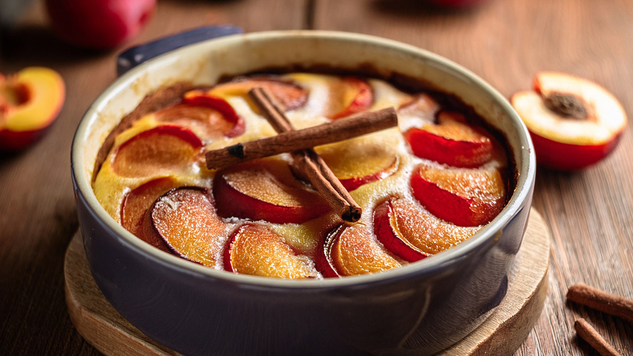 Rezeptbild für Süßer Nektarinen-Auflauf mit Zimt-Milchreis und Mandelkruste