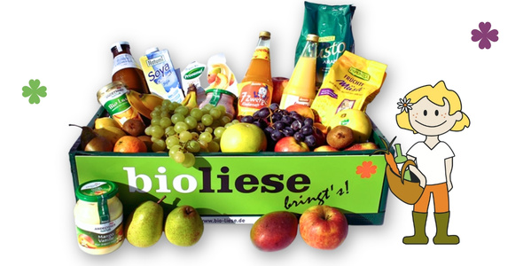 KI generiert: Ein Korb mit Bio-Produkten, Früchten und Getränken. Text: "bioliese bringt's!"