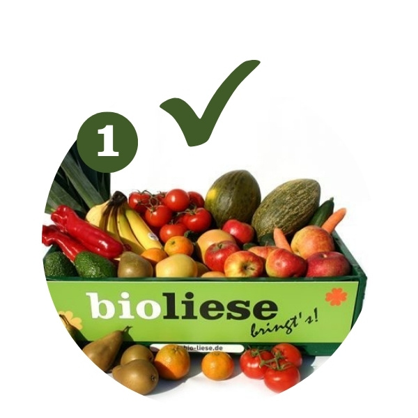 Grüne Kiste mit Obst und Gemüse