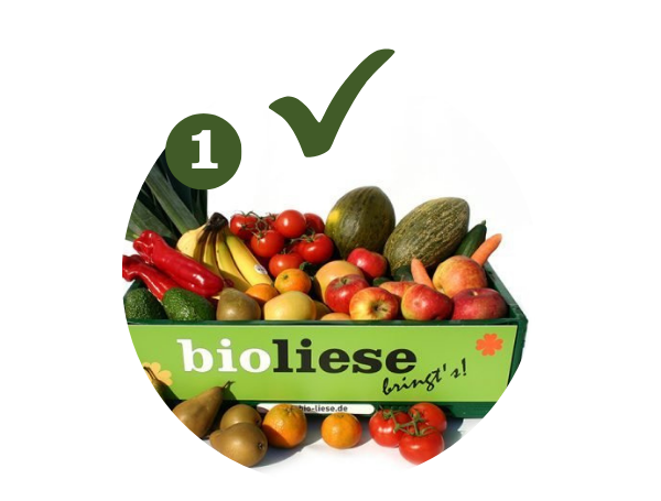 Grüne Kiste mit Obst und Gemüse